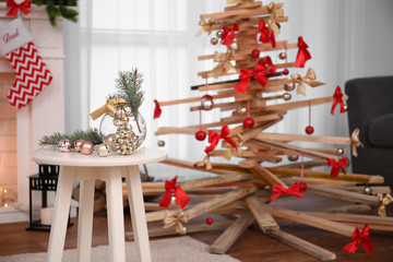 Table with Christmas decoration in living room