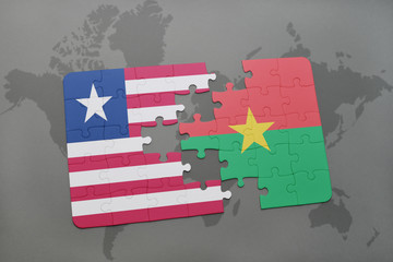 puzzle with the national flag of liberia and burkina faso on a world map