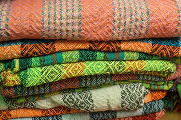 colorful blankets or fabrics on market