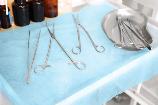 Gynecological tools on doctor's table in clinic
