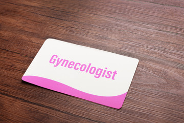 Medical service concept. Visiting card on wooden table