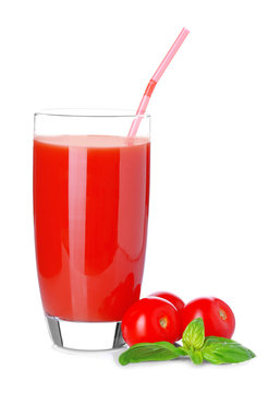 Glass with tomato juice on white background