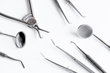 dental tools on white background top view