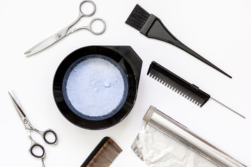 Tools for hair dye and hairdye top view white background