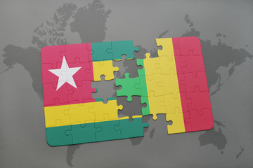 puzzle with the national flag of togo and mali on a world map