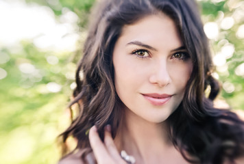 Naklejka premium Summer girl portrait. Young woman outdoors. close up.