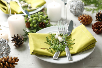 Beautiful Christmas table setting with decorations