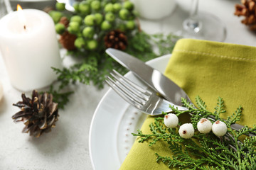 Beautiful Christmas table setting with decorations