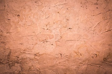 Old destroyed concrete wall with uneven structure
