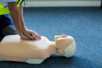 Female paramedic during cardiopulmonary resuscitation training