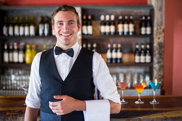 Portrait of confident waiter