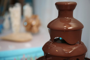 Chocolate fondue fountain, close up