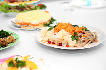 Tasty dishes on served wedding table