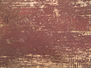 茶色のペンキの剥げた古い壁