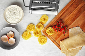 Making pasta at home. Composition on kitchen table