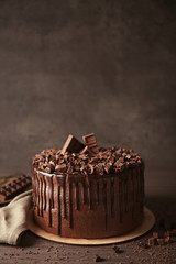 Tasty chocolate cake on table