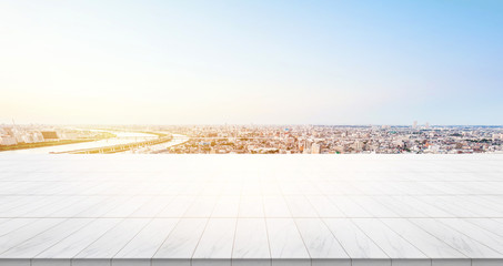 Business concept - Empty marble floor top with panoramic sky view of mountain under sunrise and morning blue bright sky for display or montage product