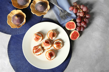 Delicious fig tarts on plate