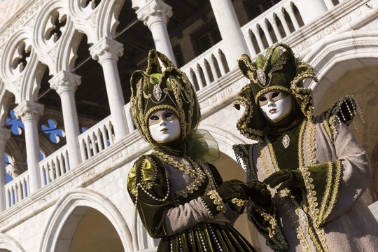 Masks during Venice Carnival in St. Marco Square, Venice, Italy