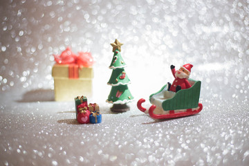 Christmas with pine branch on festive background.