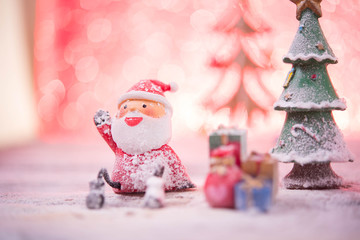 Christmas with pine branch on festive background.