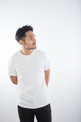 Portrait of happy young man on white background