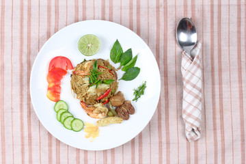 Fried jasmine rice in green curry with mixed meat.