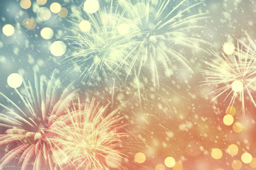 Vintage fireworks and bokeh in New Year and copy space. Abstract background holiday.