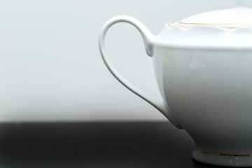 Elegant porcelain white jug in close up