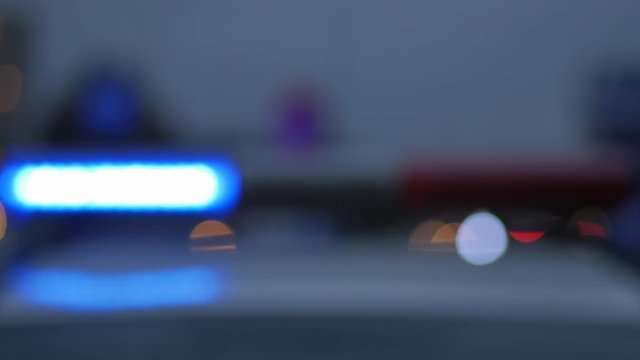 Police Car Lights. Defocused Police Car Lights At A Crime Scene