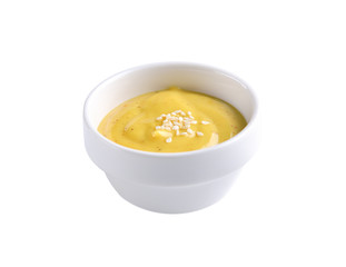 yellow mustard on white background