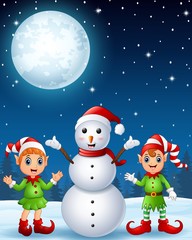 Christmas girl elf with boy elf and snowman in the winter night background