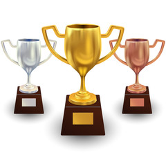 Collection of metallic trophy cup isolated on white