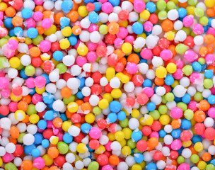 Fototapeta na wymiar colorful sugar sprinkles on white background