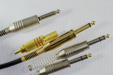 Fototapeta premium Guitar jack cables on white background