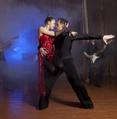 Fototapeta premium Beautiful couple in the active ballroom dance