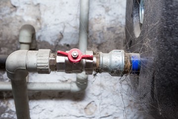 Hydraulic pipes an valves in basement - 128826561