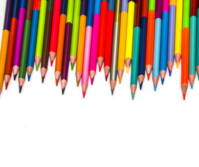 colored pencils on white background