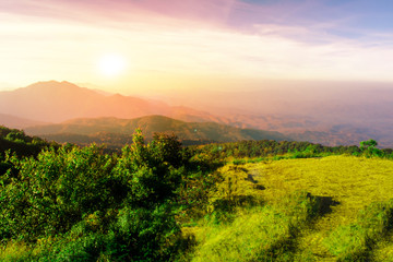 Great view of the foggy Beautiful landscape on mountain with nice sky in sunset .