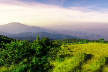 Great view of the foggy Beautiful landscape on mountain with nice sky in sunset .