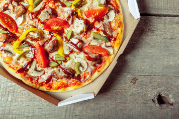 pizza on wooden table
