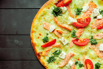 pizza on wooden table