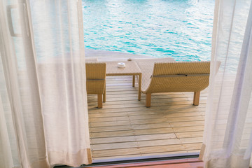 Fototapeta na wymiar Beautiful tropical Maldives resort hotel with beach and blue wat