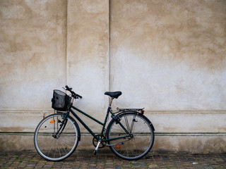 Fototapeta na wymiar Bicycle parking on concrete wall