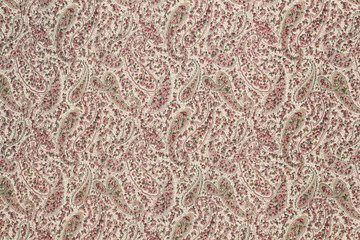 Pink cotton fabric in paisley pattern for background or texture
