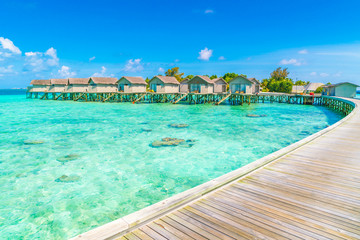 Beautiful water villas in tropical Maldives island  .