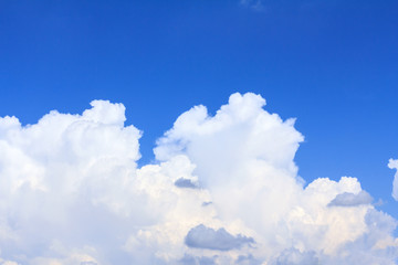 Naklejka na ściany i meble Blue sky background with white clouds and rain clouds.