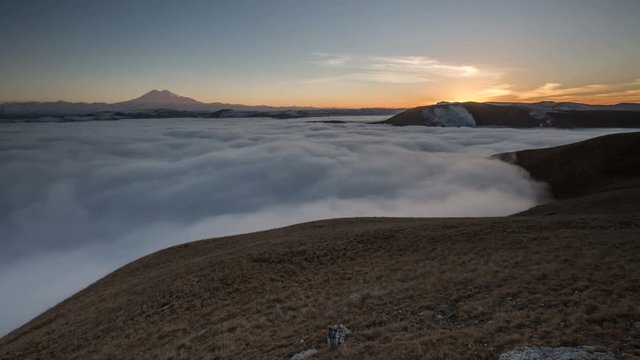 Russia, timelapse. The formation and movements of clouds up to the steep slopes of the  mountains of Central Caucasus peaks.