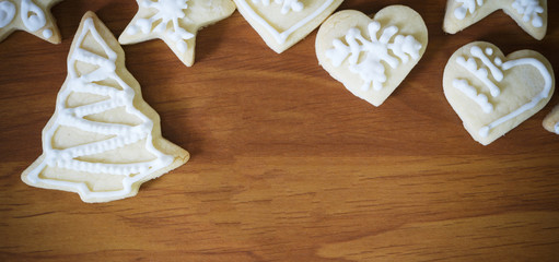 Christmas gingerbread cookies on wooden table with copy space ,