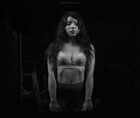 Obraz na płótnie Canvas Portrait of asian girl at gym